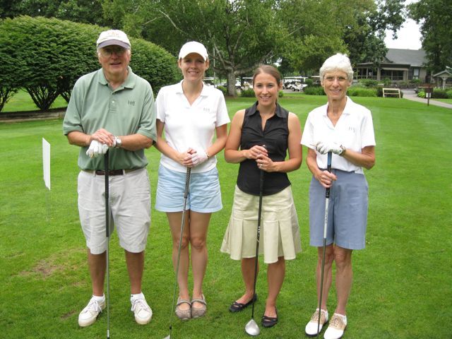 Keith (left) and Nancy Hyzer (right) of Hyzer & Jacobs are joined by more recent golfers Kaycee and Emily Chadwick