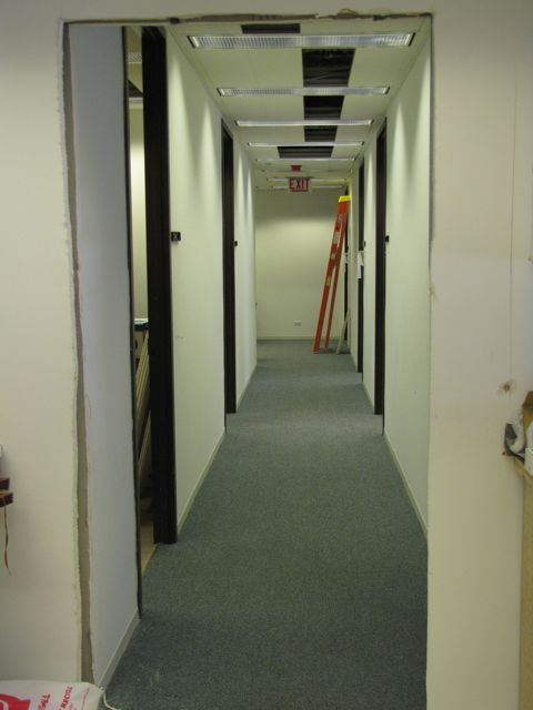 This hole was cut to provide access into previously unused space that will serve as temporary offices for ISBA staff during Phase 2.
