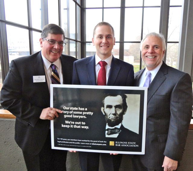 ISBA 3rd Vice President Richard D. Felice with Illinois Supreme Court Justice Robert Thomas and his son, new admittee Jonathan Thomas