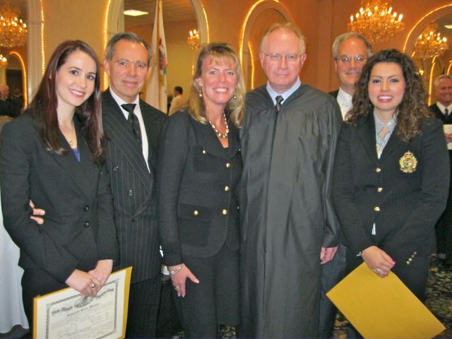 New admittee Natasha Steele, her father, ISBA member Robert Steele, ISBA Treasurer Karen Enright, Chief Justice Thomas L. Kilbride; new admittee Abigail Fleming and her father, ISBA member John Fleming