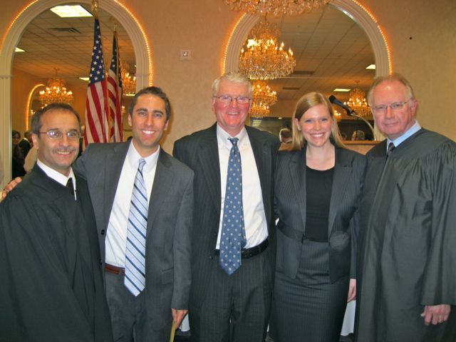 Associate Judge James L. Brusatte with his son, new admittee Michael Brusatte, Judge Eugene P. Daugherity with his daughter, new admittee Anne Daugherity and Chief Justice Thomas L. Kilbride
