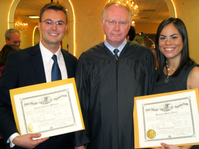 New admittee Clark Miljush, Chief Justice Thomas L. Kilbride and new admittee Pamela Dones