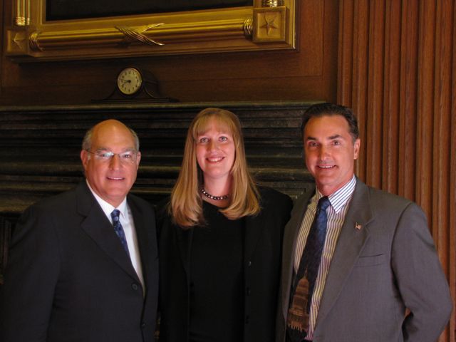 ISBA President Mark D. Hassakis with new admittees Carey C. Gill and L. Douglas Gill 