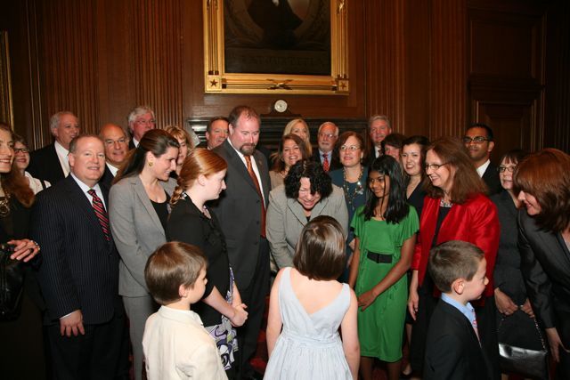 U.S. Supreme Court Justice speaks with the children of ISBA new admittees.