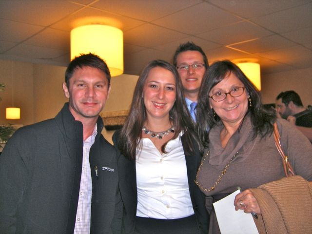 Those attending the Fifth District ceremony to help Renee Meyer celebrate the day were her uncle Gary Bollmann (left), friend Peter Sullivan and mother Barbara Meyer.