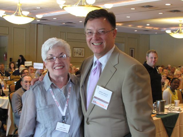 ISBA President John G. Locallo with ISBA Executive Assistant JoAnn Hibbs, who was honored for her 34 years of service to the Association.