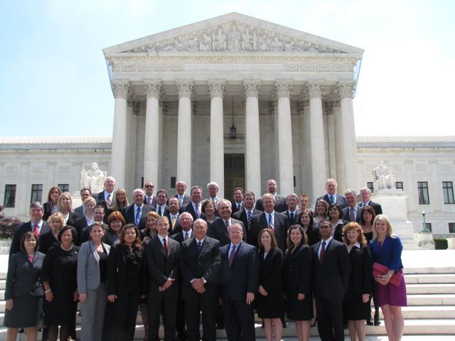 ISBA President Mark D. Hassakis with the new admittees on the steps of the U.S. Supreme Court.