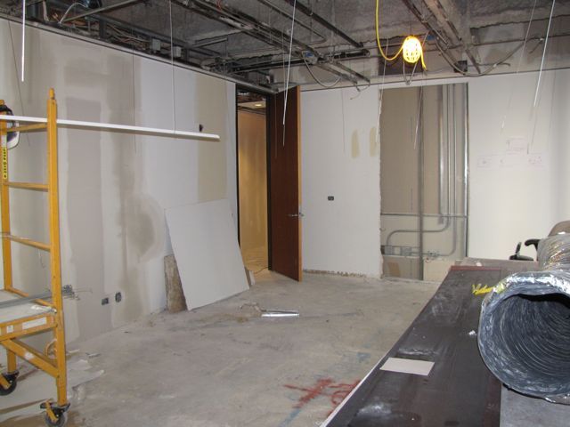The library/conference room has been slightly enlarged by removing the old shelving and wired for a video monitor for use during meetings.
