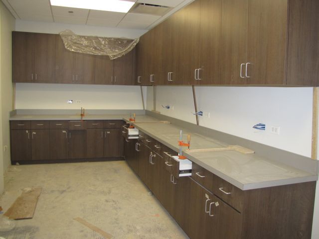 Cabinets and counters are nearly complete in the copy/mail room.