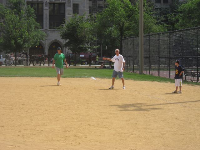 ISBA Board member Judge Steve Pacey on 1st base after driving in the ISBA's only run.