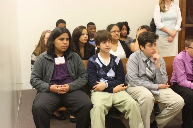 Students listen in court at the Daley Center.