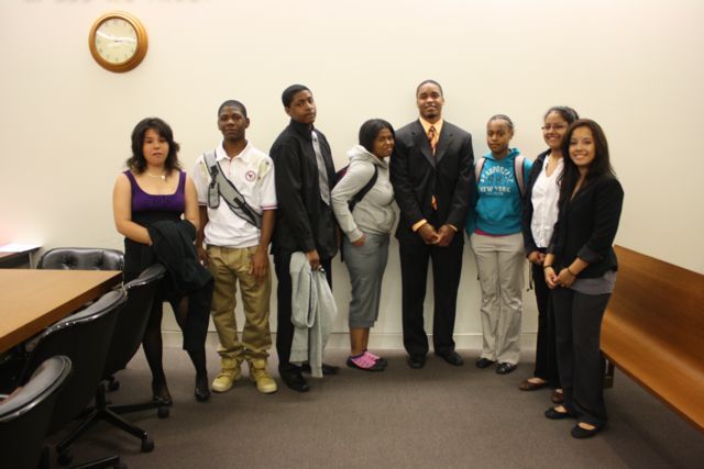 Teacher Terrance Garmon (4th from left) with students in the Daley Center.