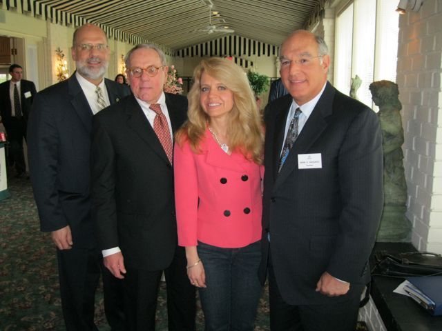 Michele M. Jochner, Law Clerk to Justice Charles E. Freeman, Illinois Supreme Court, presented an Update on Supreme Court Rules at the Quincy Regional CLE. Local hosts for the meeting were Judge Mark A. Schuering (ret.), James L. Palmer, and Talmadge G. Brenner, President of the Adams County Bar Association (not pictured). ISBA President Mark D. Hassakis greeted attendees from throughout the 8th Circuit at a reception the evening before the all-day CLE on March 25.
