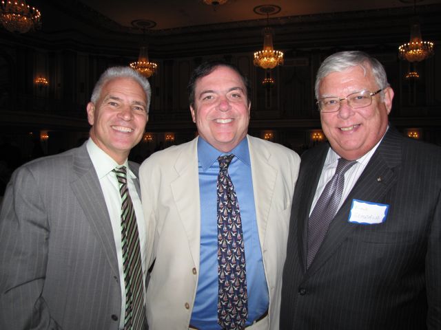 ISBA Board member Stephen Komie (center) and friends