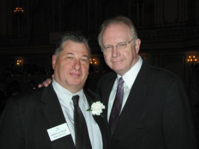 ISBA Board member Mauro Glorioso and Illinois Supreme Court Chief Justice Thomas Kilbride