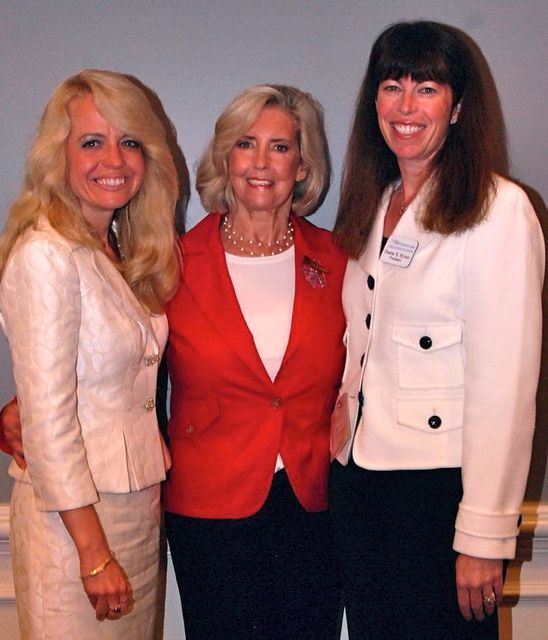 Michele Jochner, Lilly Ledbetter, Deane Brown, President of the Women's Bar Association of Illinois
