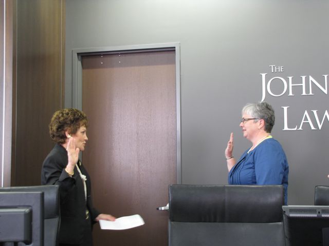 Illinois Supreme Court Justice Rita B. Graman swears in M. Carol Pope as the new President of the Illinois Judges Association