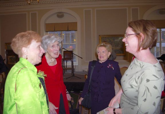Judge Muphy is congratulated by Justice McMorrow, Janet Piper Voss (Executive Director of LAP), and Judge Murphy's daughter, Brigid Wolff.