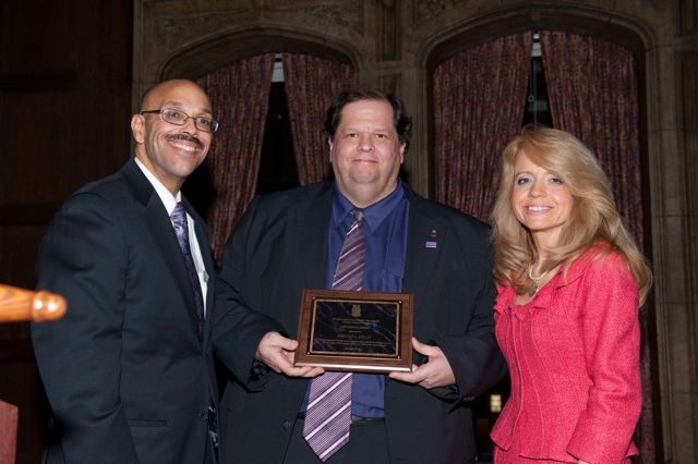 Pierre Priestley and Michele Jochner present a Chicago Alumni Chapter Centennial Award to past Chapter Justice, BJ Maley