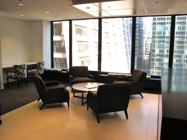 Main lobby and reception area with member workstations at left