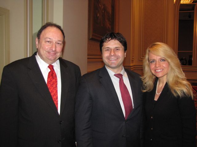 Cook County Judge Michael B. Hyman, Advocates Society President Robert Groszek and Michele Jochner