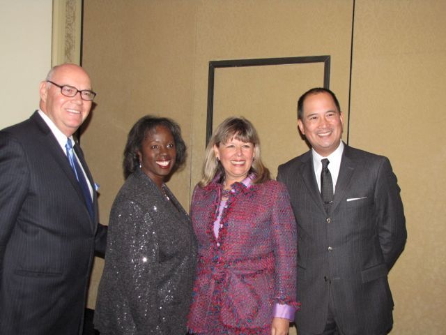 Chief Judge Holderman (left) with Advocate for Diversity Award recipients Patricia Brown Holmes, Paula H. Holderman and Michael P. Chu