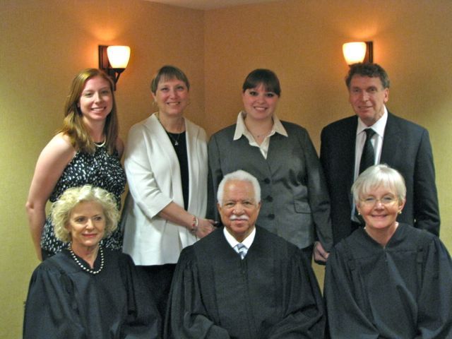 New admittee Caroline Simon and family with the Supreme Court Justices