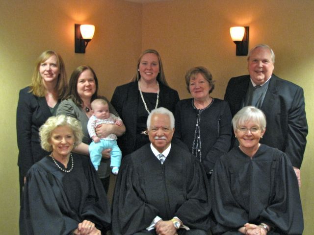 New Admittee Catherine Howlett and family with the Supreme Court Justices