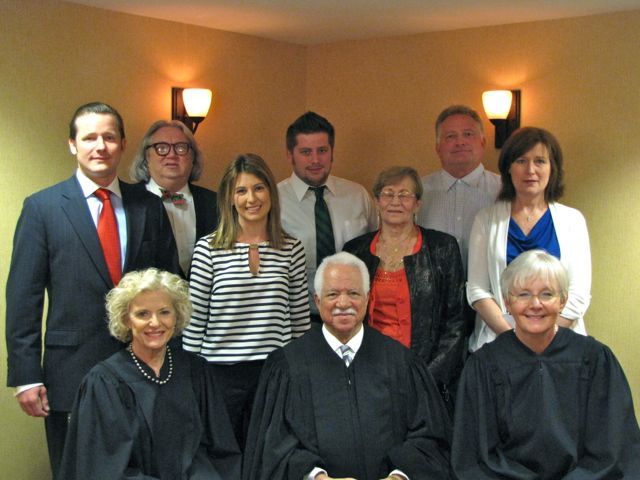 New admittee Michael Synowiecki and family with the Supreme Court Justices