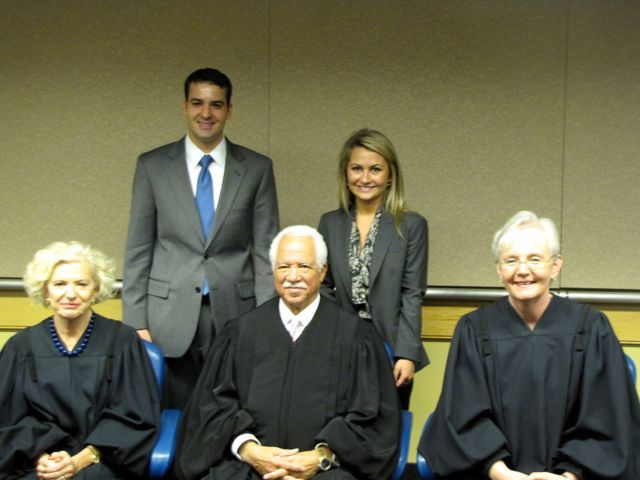 New admittee Macie Kriger and friends with Justices Burke, Freeman and Theis