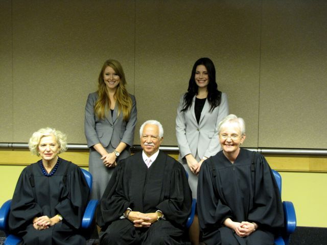 New admittees Amanda Graham and Kathryn Kizer with Justices Burke, Freeman and Theis