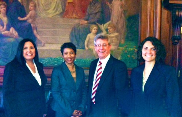 New admittee Sarah Woollen, speaker Geri Lynn Arrindell, speaker and ISBA Board member Carl Draper, and new admittee Bobi James.