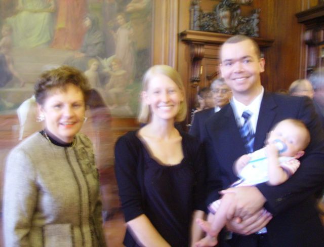 Justice Rita Garman, Sarah McNeal, new admittee Brett McNeal and their son Travis.