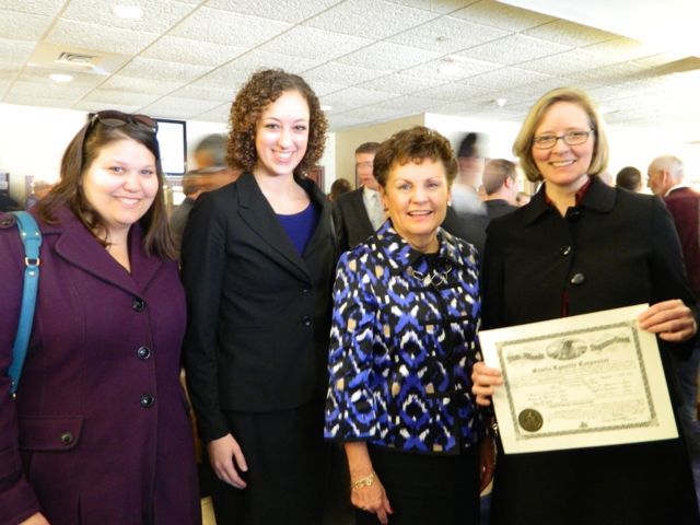 New admittees Lisa R. Schlessinger (Savoy), Rachel E. Petter (Springfield), and Starla L. Carpenter (Urbana) with Illinois Supreme Court Justice Rita B. Garman 
