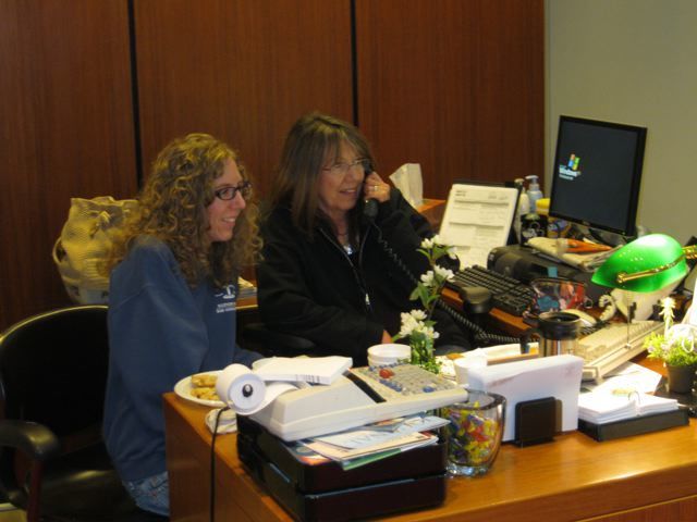 ISBA receptionist Bev Oshesky, assisted by her daughter McKenzie Oshesky, handled hundreds of callers seeking legal information on Ask a Lawyer Day. 