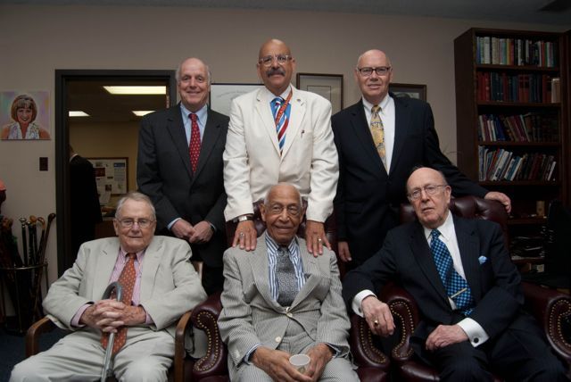 Judge Leighton is congratulated by fellow colleagues on the bench. From Left to Right (back row): Hon. Wayne R. Andersen (Ret.), U.S. District Court for the Northern District of Illinois; Hon. William H. Hooks, Circuit Court of Cook County and Chair of the event Steering Committee; Hon. James F. Holderman, Chief Judge, United States District Court for the Northern District of Illinois; Hon. Richard D. Cudahy (Ret.), United States Court of Appeals for the Seventh Circuit; Hon. George Leighton; Hon. William J. Bauer, United States Court of Appeals for the Seventh Circuit.