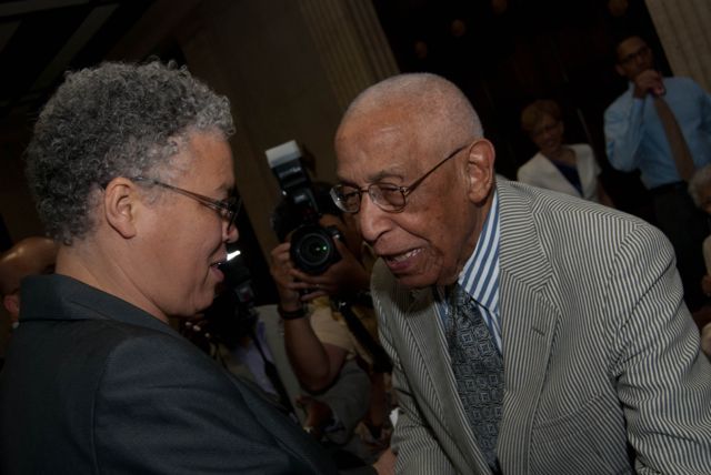 Hon. Toni Preckwinkle, President, Cook County Board of Commissioners, greets Judge Leighton.