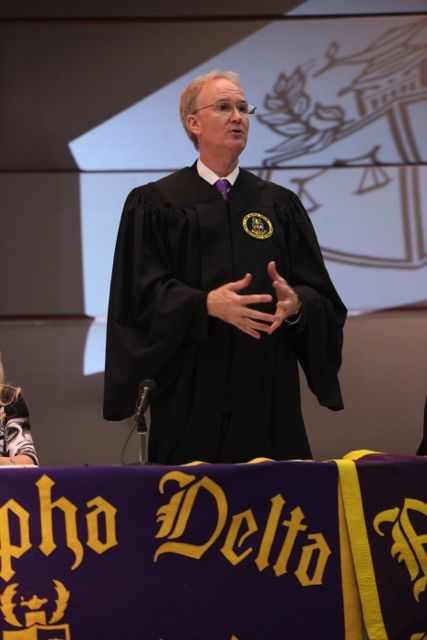 John K. Norris, Justice of Phi Alpha Delta's District XI, leaves the new initiates with closing thoughts.