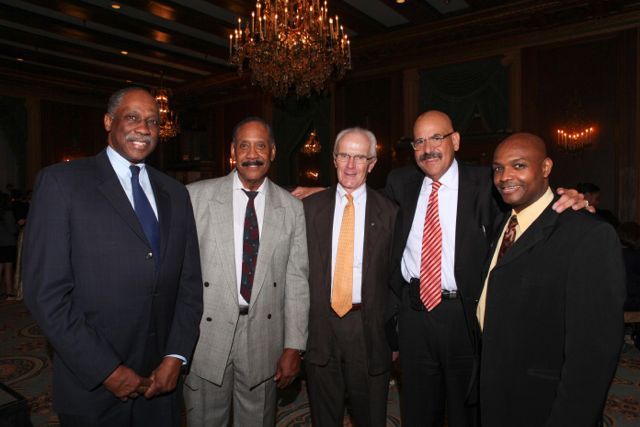 Honoree Judge William H. Hooks (second from right) is congratulated by Hon. Leonard M. Murray of the Circuit Court of Cook County, Deputy Sheriff Walter Hudson, Attorney John Lowrey, and Hon. Carl Walker, Circuit Court of Cook County.