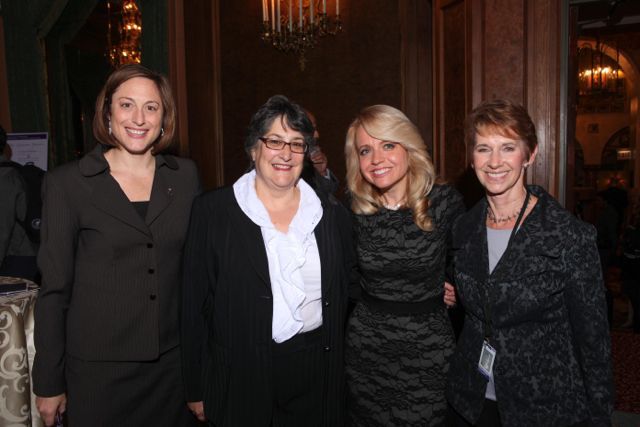 Michele Jochner (second from right) visits with Erin Kelly, Sharon Ballin and Sharon Eiseman.