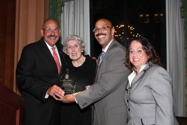Judge William H. Hooks receives the award from its namesake, Justice Mary Ann G. McMorrow (Ret.), PAD Chicago Alumni Chapter Justice Pierre W. Priestley and Deidre Baumann, Chair of the event.