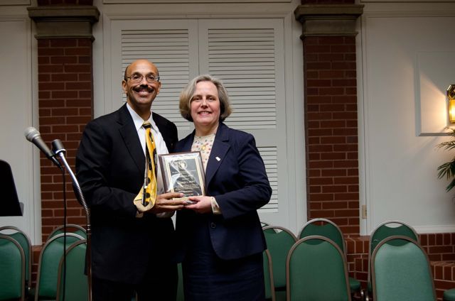 Presentation of the Chapter's Centennial Award to Past Chapter Justice Sharon Hunt by current Chapter Justice Pierre Priestley.