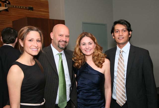 IBF Secretary Shawn Kasserman (second from left) enjoys the evening with guests