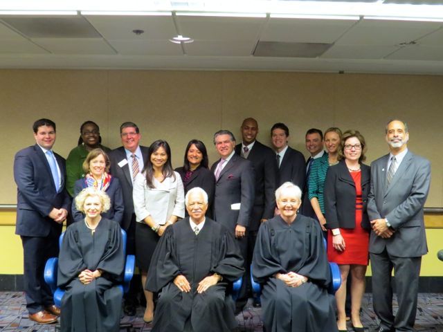 The three Supreme Court Justices with bar association representatives.