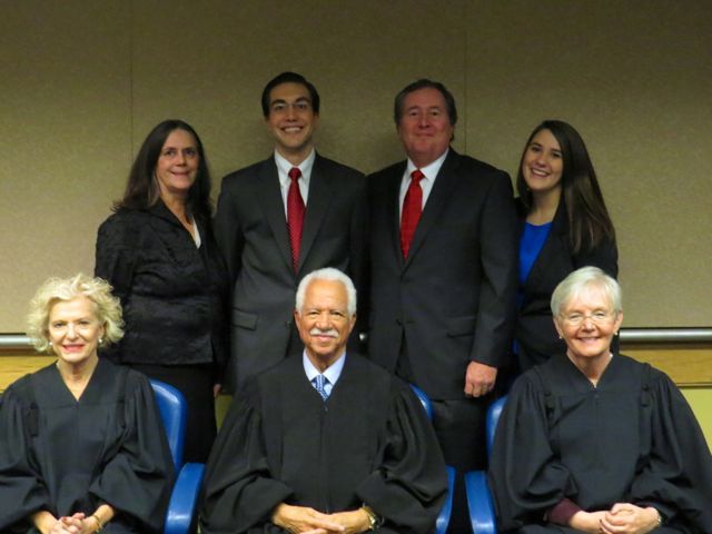 New admittee Matthew Howeth and family with Justices Burke, Freeman and Theis.