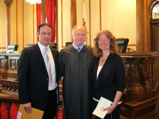 New admittee Nick Nelson, Chief Justice Thomas L. Kilbride and mother Kathy Nelson.

