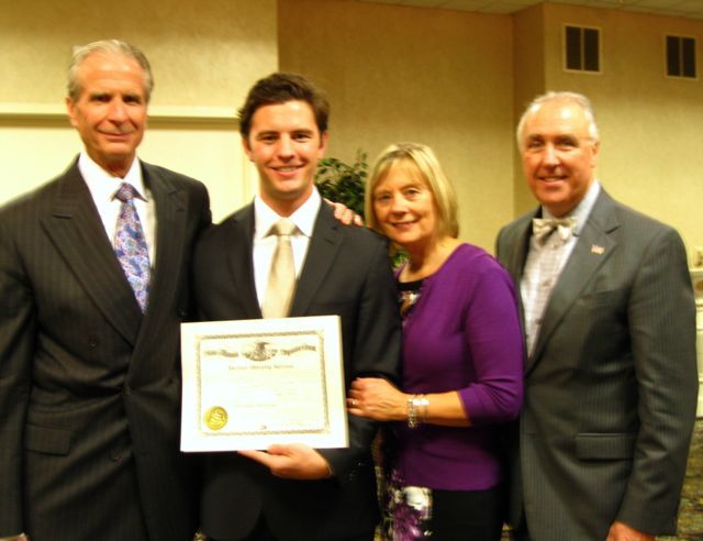 Attorney Gerald Kielian, his wife Galey with their son, new admittee Jordan Kielian, and ISBA 2nd Vice President Umberto S. Davi