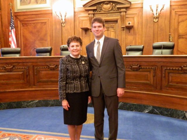 New admittee Michael Neumann of Bloomington with Illinois Supreme Court Justice Rita B. Garman
