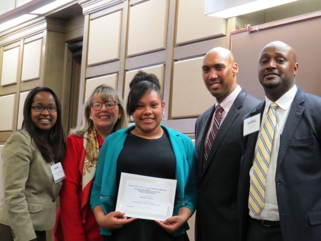 Event co-chairs Kenya Jenkins-Wright (left) and David Kadzai (right) with ISBA President-elect Paula H. Holderman, a student accepting the 1st place prize on behalf of Karsyn Terry of Skinner High School and CCBA President John A. Fairman.