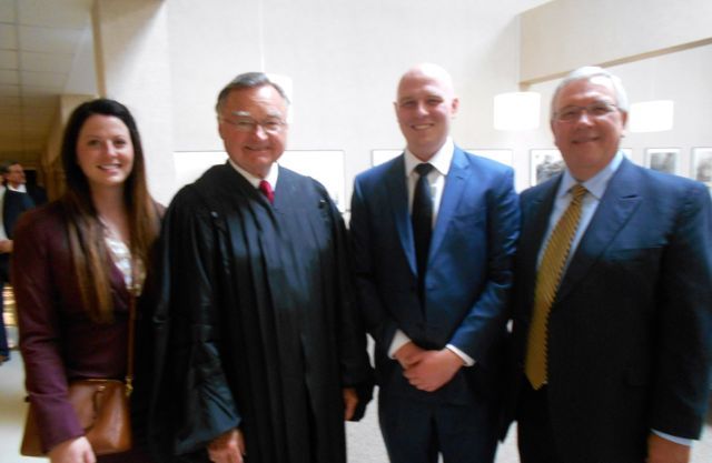 Justice Lloyd Karmeier with Admitee Mallory Fisk, Admittee Greg Motil and his father, Attorney Greg Motil